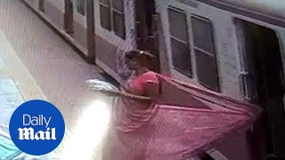 Horrifying moment women dragged after saree got stuck in train [upl. by Nordna]